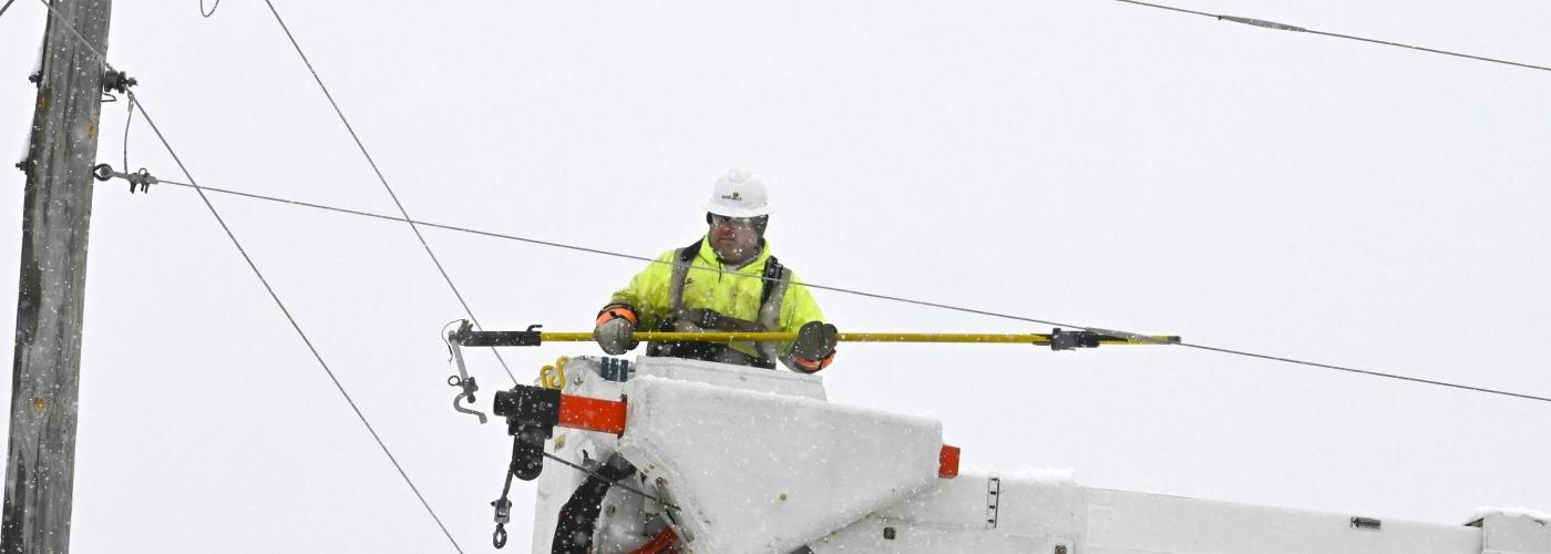 Crow Wing Power lineworker restoring power during a winter storm. 